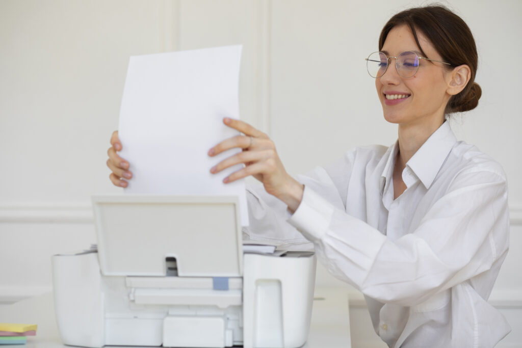 smiley-woman-using-printer-side-view